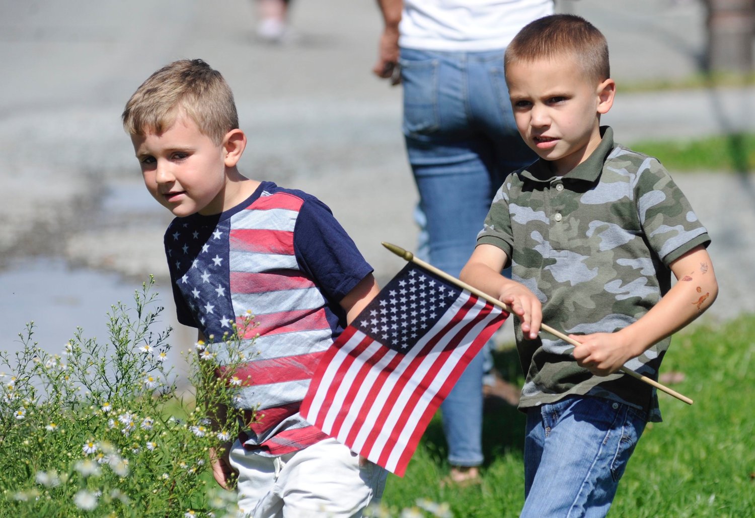 Zachary Halbig, left, and Jason Green, wait for Fire Department of Beach Lake 100th anniversary parade.  Both six-year olds are from Beach Lake, PA...